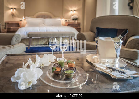 Place setting in luxury hotel room Stock Photo