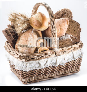 Different types of bread in the basket on a white background. Stock Photo