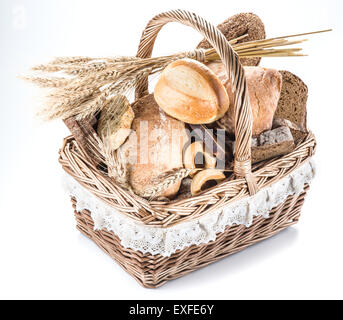Different types of bread in the basket on a white background. Stock Photo