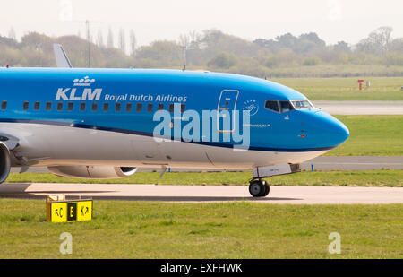 Royal Dutch Airlines (KLM) Boeing 737 taxiing on Manchester International Airport taxiway. Stock Photo