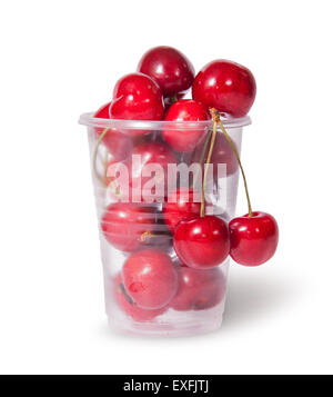 Red juicy sweet cherries in a plastic cup isolated on white background Stock Photo