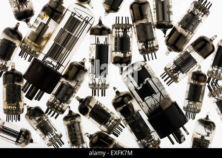Collection of old used glass vacuum tubes used in radio and early tv crt amplifiers anode and cathode with filament collectors Stock Photo