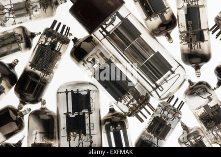 Collection of old used glass vacuum tubes used in radio and early tv crt amplifiers anode and cathode with filament collectors Stock Photo