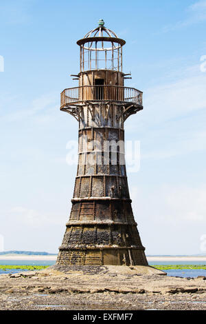 Derelict Whiteford lighthouse on the Gower peninsula in Wales is the only wave swept cast iron lighthouse in Britain Stock Photo