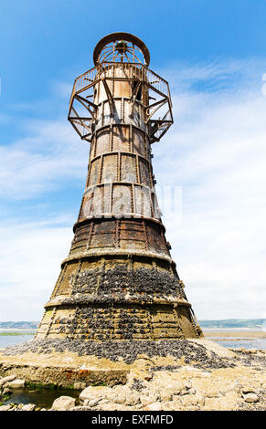 Derelict Whiteford lighthouse on the Gower peninsula in Wales is the only wave swept cast iron lighthouse in Britain Stock Photo