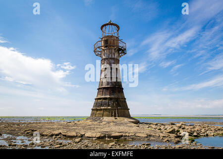 Derelict Whiteford lighthouse on the Gower peninsula in Wales is the only wave swept cast iron lighthouse in Britain Stock Photo