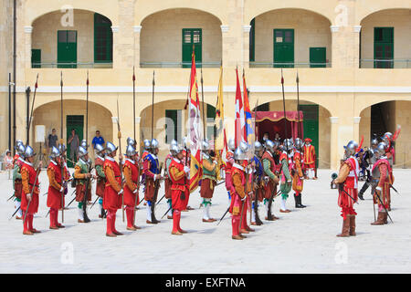 Inspection of the garrison at Fort Saint Elmo by the Grand Bailiff in Valletta, Malta Stock Photo