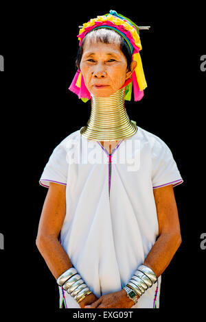 Senior Kayan hill tribe woman portrait against a black background in Chiang Mai, Thailand, Asia. Stock Photo