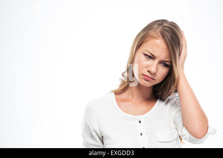 Portrait of a sad woman having headache isolated on a white background Stock Photo