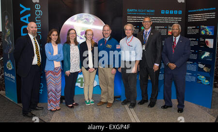 From left to right: Christopher Copelan, education specialist, NASA; Makayla Stewart, student from Nicholson Elementary School; Maureen Pollitz, teacher from Nicholson Elementary School; Anna Lander, student at Picayune Memorial High School; John Grunsfeld, astronaut and associate administrator for the science mission directorate, NASA; Dave Lavery, program executive for solar system exploration, NASA; Donald James, associate administrator for education, NASA; and Dr. Roosevelt Johnson, deputy associate administrator for education, NASA, pose for a photo on Tuesday, April 28, 2015 at NASA Head Stock Photo
