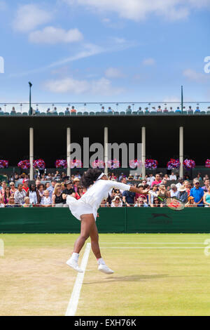 Serena Williams warms up her serve on court No. 5 during the Wimbledon Championships 2015 Stock Photo