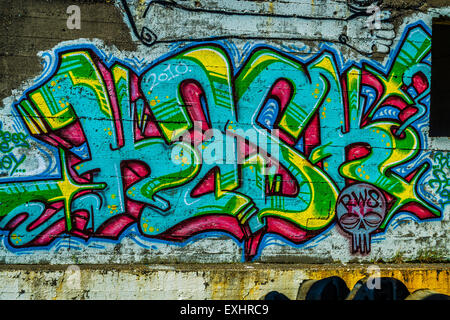 Close-up of Icelandic graffiti on the side of a fish freezing plant, Grundarfjordur, Iceland. Stock Photo