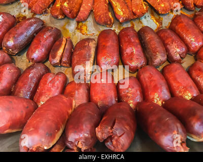 Sausages cooking in an outdoor market in Alicante, Spain Stock Photo
