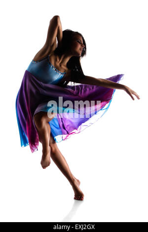 Silhouette of a beautiful female modern jazz contemporary style dancer isolated on a white background. Dancer is barefoot and we Stock Photo