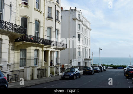 Brighton UK Tuesday 14th July 2015 - PCSO's at a flat in Chesham Place Kemp Town Brighton where a tourist was believed to have been murdered . Stock Photo