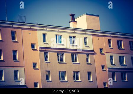 Vintage photo of block of flats abstraction. Close up of moder building Stock Photo