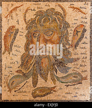 CORDOBA, SPAIN - MAY 25, 2015: The ancient roman mosaic of gon Oceanus from 2 - 3 cent. in Alcazar de los Reyes Cristianos castl Stock Photo
