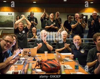 Laurel, Maryland, USA. 14th July, 2015. Members of the New Horizons science team react to seeing the last and sharpest image of Pluto during the flyby of the space probe at the Johns Hopkins University Applied Physics Laboratory July 14, 2015 in Laurel, Maryland.