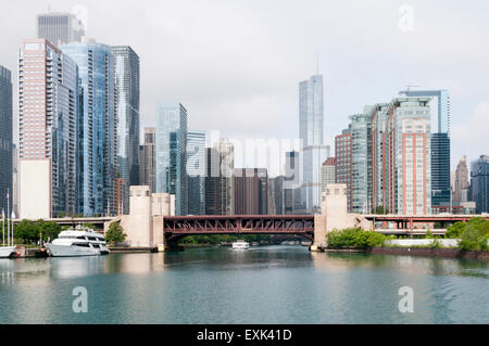 View of skyscrapers along the Chicago River where Lake Shore Drive crosses the double-deck bascule Outer Drive Bridge. Stock Photo