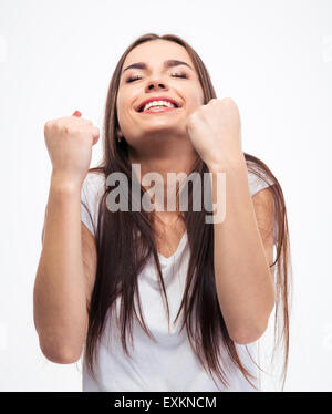 Happy young woman celebrating her success isolated on a white background Stock Photo