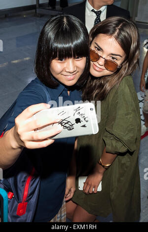 Australian actress, singer and songwriter Maia Mitchell takes pictures with fans upon her arrival at Narita International Airport on July 15, 2015, Narita, Japan. Maia is in Japan to promote Disney Channel original movie ''Teen Beach 2, '' which will be airing on July 25. She will attend a premiere screening/fan event on July 18th in Tokyo. (Rodrigo Reyes Marin/AFLO) Stock Photo