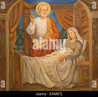 TEL AVIV, ISRAEL - MARCH 2, 2015: The modern paint of scene Saint Peter raised Tabitha  from st. Peters church in old Jaffa. Stock Photo