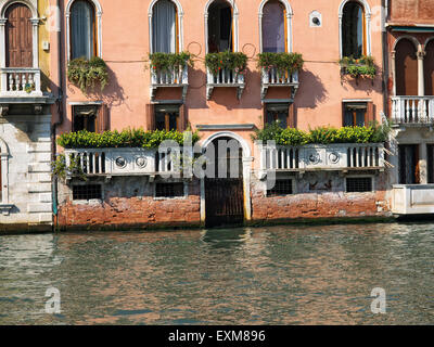 Detail of the facade of a nice house in the Grand Canal in the city of Venice. Italy Stock Photo