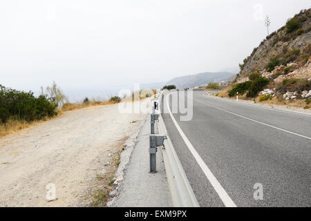Empty coastal road, two lanes, Spain. Stock Photo