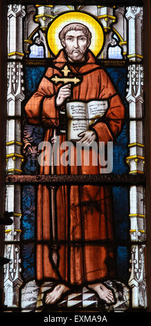 Stained glass window depicting Saint Francis of Assisi in the Church of Stabroek, Belgium. Stock Photo