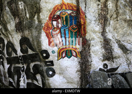 Buddhist Symbols on a Mani Stone Prayer wall, Buddhist Stupa, Ghat village, Sagarmatha National Park, Solukhumbu district Khumbu Stock Photo