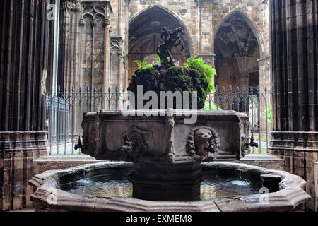 Saint George and dragon in cloister courtyard of Santa Eulalia Cathedral in Barcelona, Catalonia, Spain Stock Photo