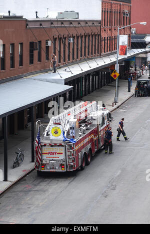 Fire department New York Ladder Truck in the streets of New york City, Manhattan, USA. Stock Photo