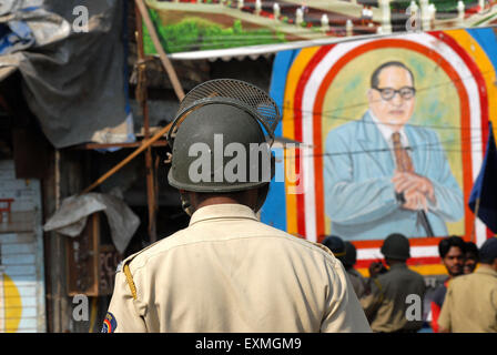 Police personnel patrolling rioters break glass panes of vehicles Bhandup Dalit community resort to violent protests Mumbai Stock Photo