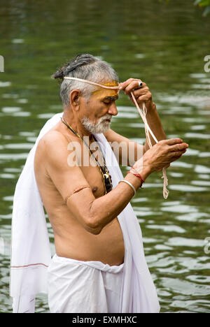 The ritual Brahmin changing of the thread ceremony Meenakshi Temple in ...