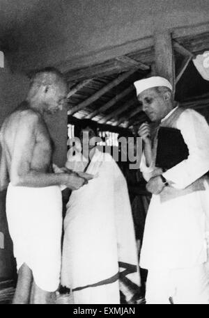 Mahatma Gandhi and Jawaharlal Nehru, at Sevagram a village in the state ...