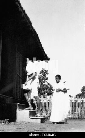 Mahatma Gandhi entering a hut at Sevagram Ashram ; 1941 ; Amtus Salam NO MR Stock Photo