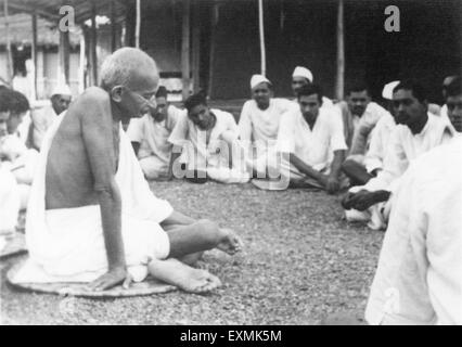 Mahatma Gandhi speaking to visitors at Sevagram Ashram ; 1942 NO MR ...