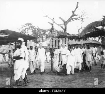 Mahatma Gandhi ; supported by Amtus Salam on march throughaea effectedy Hindu Muslim riots Noakhali East Bengal Stock Photo