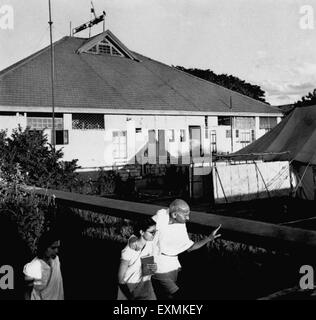 Sushila Nayar ; Abha Gandhi and Mahatma Gandhi going for prayer at the nature cure clinic in Pune ; 1944 NO MR Stock Photo