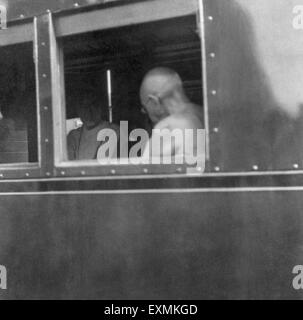 Rajkumari Amrit Kaur ; Khan Abdul Gaffar Khan and Mahatma Gandhi sitting in the train at Nagpur station Stock Photo