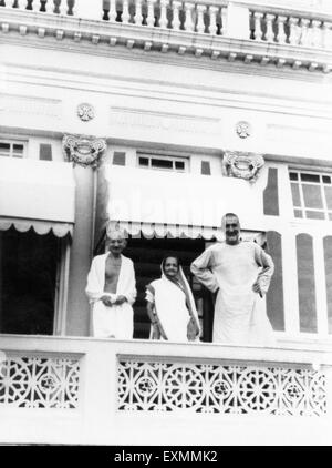Mahatma Gandhi ; Kasturba Gandhi and Khan Abdul Gaffar Khan standing on a balcony ; Mumbai ; 1940 ; India NO MR Stock Photo