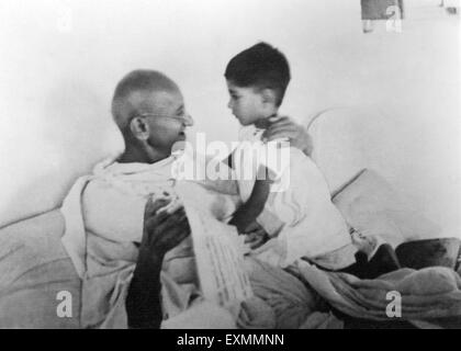 Mahatma Gandhi and his grandson Rajmohan his birthday at Birla House , New Delhi , 1937 , India Stock Photo