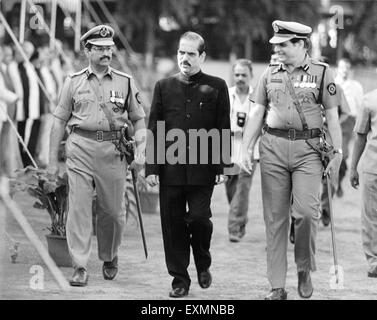 Manohar Gajanan Joshi Indian politician prominent leader of the Shiv Sena political party walking with Police officers Bombay Mumbai Maharashtra India Stock Photo