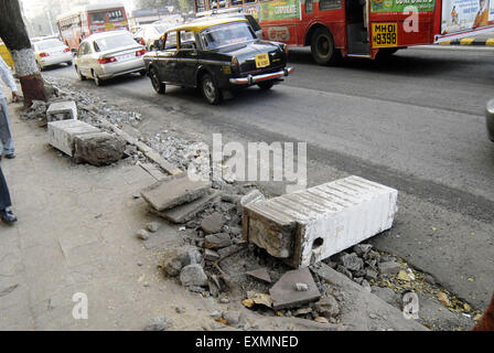 Pavement damaged broken ; Churchgate ; Bombay ; Mumbai ; Maharashtra ; India ; Asia ; Asian ; Indian Stock Photo