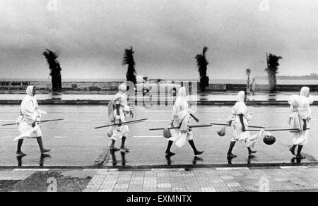 Jain monks walking on marine drive mumbai india Stock Photo