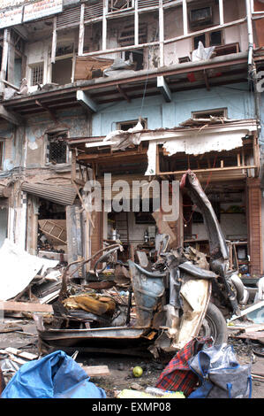 car and building damage in terror bomb blast at Zaveri Bazaar Kalbadevi Bombay Mumbai city Maharashtra India 2003 Stock Photo