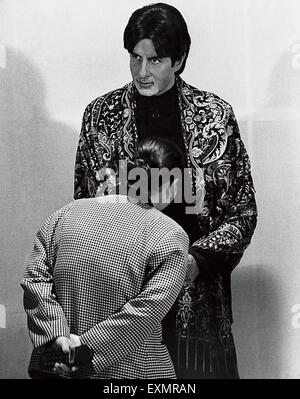 Wax figure Indian Bollywood actor Amitabh Bachchan being inspected by a tourist at Hotel la Meridian Mumbai India Stock Photo