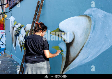 Graffiti/Street Artist At Work, Brick Lane, London, Engalnd Stock Photo