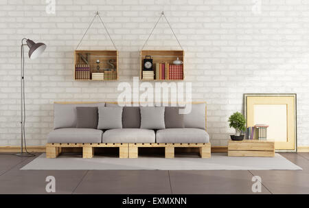 Living room with pallet sofa and wooden crate with books on brick wall - 3D Rendering Stock Photo