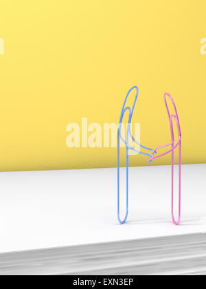 3D Rendering, paper clips holding hands Stock Photo